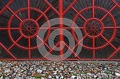 Detail of a red forged metallic gate Stock Photo