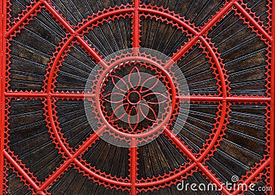 Detail of a red forged metallic gate Stock Photo