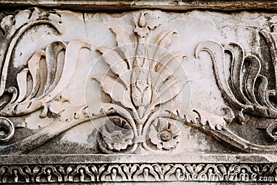 Detail of relief wall with stone carving, old Rome Stock Photo