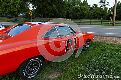 Detail of a replica of the General Lee Charger, from the television series The Dukes of Hazzard, parked along a country road Editorial Stock Photo