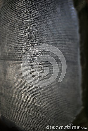 A detail of the Rosetta Stone with the demotic and old greek script Stock Photo
