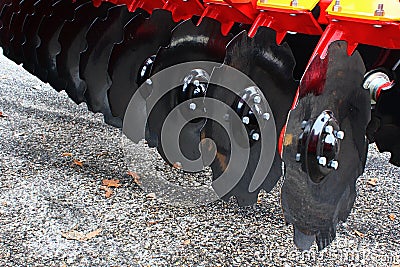 Detail of rotary disc on Swedish modern multipurpose agricultural cultivator Vaderstad TopDown 300 Editorial Stock Photo