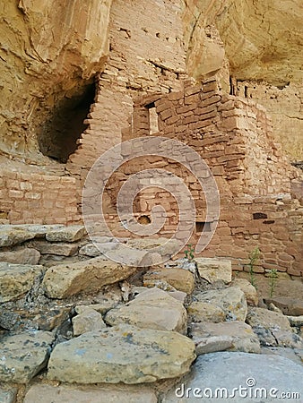 Detail of ruins at Mesa Verde National Park with rocks and plants Stock Photo