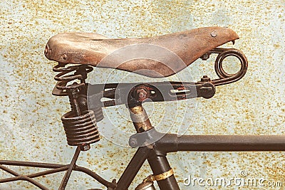 Detail of a rusted ancient bicycle with leather seat Stock Photo