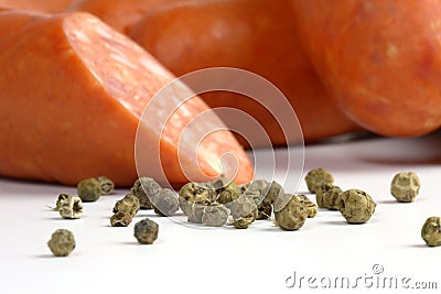 Detail of sausages with green pepper Stock Photo