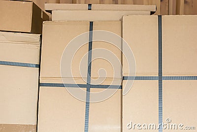 Stacked cardboard boxes in a warehouse Stock Photo