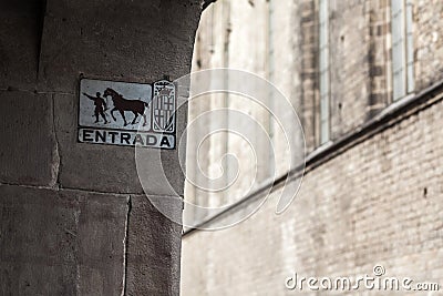 Detail sign entrada, formerly indicated direction of horses in c Editorial Stock Photo