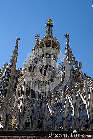 Detail of some spiers decorating the exterior of the gothic cathedral of Milan, Italy Stock Photo