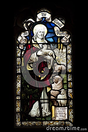 Detail of a stained glass window with a shepherd in Crowland Abbey, Crowland, Lincolnshire, England - 27th April 2013 Editorial Stock Photo