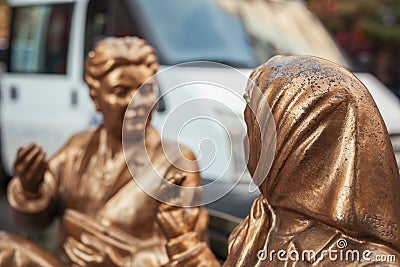 Detail of the statue of two women having a chat while stting on bench in Eskisehir Turkey Editorial Stock Photo