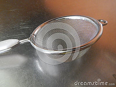 Detail of a tea sifter net Stock Photo