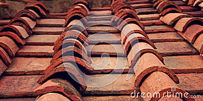 Detail of terracotta roof tiles. Aged photo. Stock Photo
