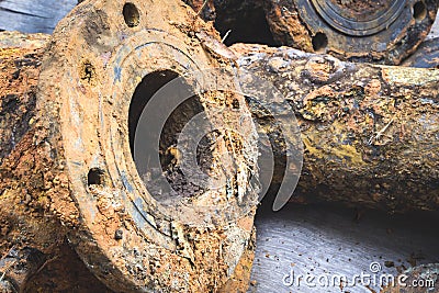 Detail and texture of the Rusty steel water supply pipe Stock Photo