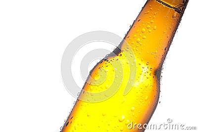 Detail of tilted bottle of fresh beer with drops Stock Photo