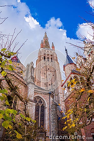 Detail of the tower of The Church of our Lady in Bruges Stock Photo