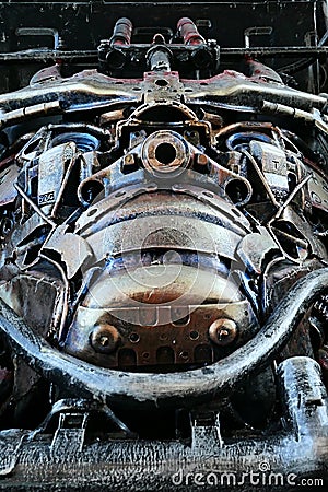 Detail of transformer head in replica of grand tourer car Mercedes AMG GT R made from scrap metal Editorial Stock Photo