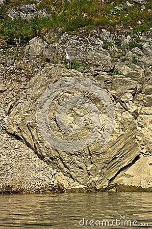 Detail of vertical rocks at river Uvac gorge on a sunny summer morning Stock Photo