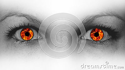 Detail view of female eyes with flames Stock Photo