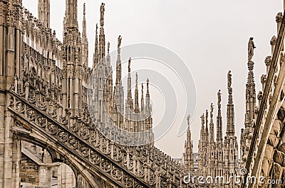 Detail view of stone sculptures on roofs of Duomo Milano Stock Photo