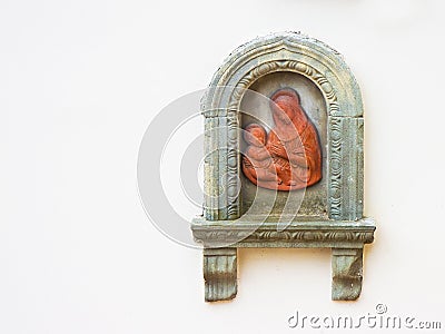 Detail of the Virgin Mary in terracotta sculpture with Jesus chi Stock Photo