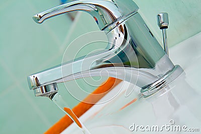 Detail of water faucet in bathroom Stock Photo