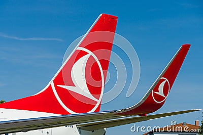 Detail of the wing of a short-to medium-range twinjet narrow-body airliner Boeing 737-800. Editorial Stock Photo