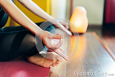 Detail of woman`s hands in relaxation yoga position Stock Photo