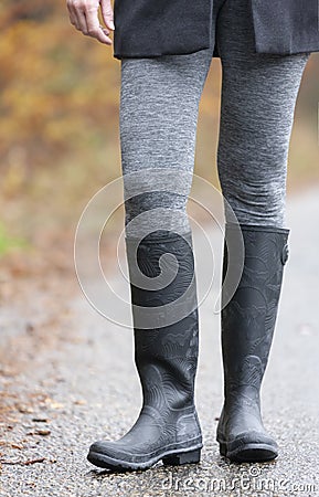 detail woman wearing black wellingtons Stock Photo