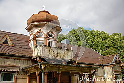 Detail of wooden fairytale house in tradtional style in the town of Liepaja, Latvia Editorial Stock Photo