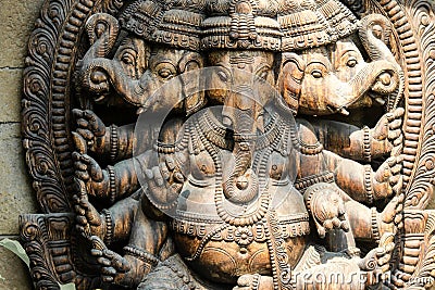 The detail of the wooden statue of Ganesha Stock Photo