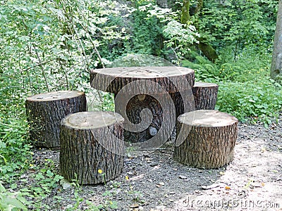 detail of wooden table and seat make with trunk of pine Stock Photo