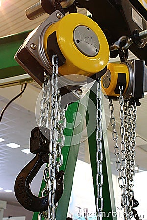 Detail of Yale Manual Chain Hoists with large black steel hook on chain end Editorial Stock Photo