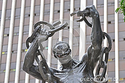 Detail of the Zambian Freedom statue in front of the government offices in downtown Lusaka, Zambia Editorial Stock Photo