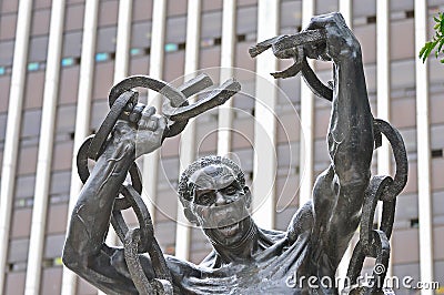 Detail of the Zambian Freedom statue in front of the government offices in downtown Lusaka, Zambia Editorial Stock Photo