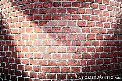 Detailed close up view at a red brick wall with multiple spotlights on it Stock Photo