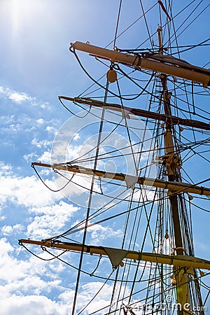 Detailed closeup of mast rigging top on sail boat Stock Photo