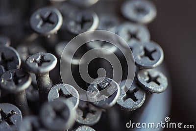 Detailed dark background and texture full frame of pile metal steel nails for construction of carpenter Stock Photo