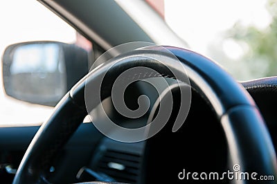 Detailed interior image of leather steering wheel Stock Photo
