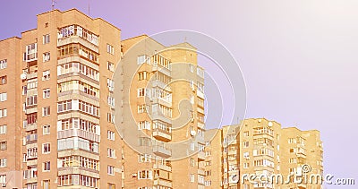 Detailed photo of multi-storey residential building with lots of balconies and windows. Hostels for poor people in Russia and Ukr Stock Photo