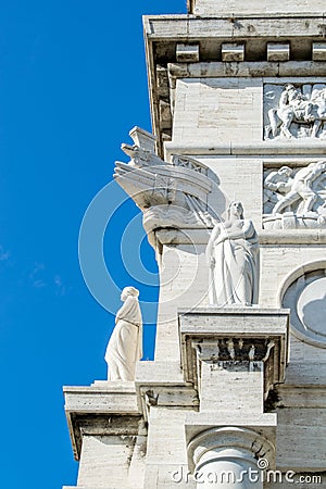 Detailed, richly decorated architectonic part from the arch of the Victoria square in Genoa, Italy Stock Photo