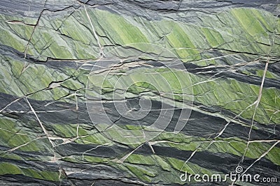 detailed shot of green slate with unique mineral patterns Stock Photo