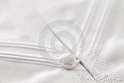 Detailed stitching of Kandura, the ankle-length garment Stock Photo