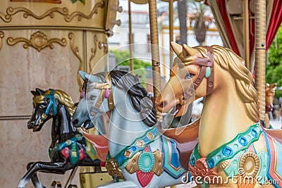Detailed view of colorful horses from a vintage classic carousel Stock Photo