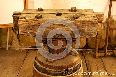 view of a mill base in the interior of a historic windmill Stock Photo