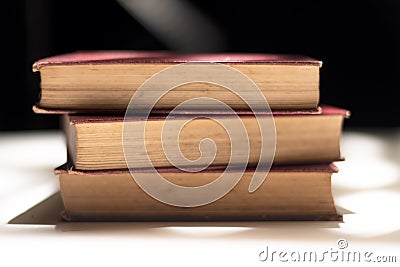 Detailed view of stack of three old books Stock Photo
