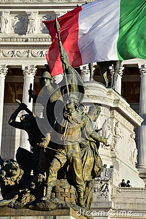 Details of Altair of the Fatherland, Rome Italy - Soldiers fight with Italian flag on the back Stock Photo