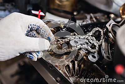 Details of car engine chain and gears, Cut away engine Stock Photo