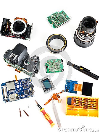 Details of disassembled DSLR and tools for repair isolated Stock Photo