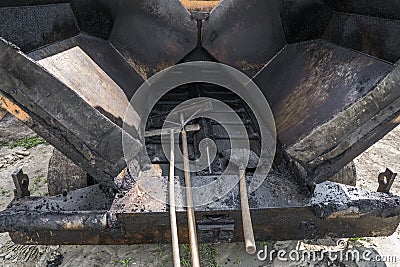 Details of empty asphalt paver machine during road construction and repairing works. Stock Photo
