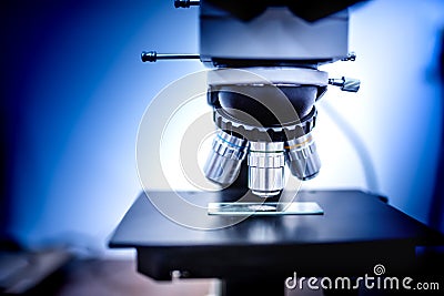 details of industrial scientific microscope used in medical, chemical and biochemistry fields Stock Photo